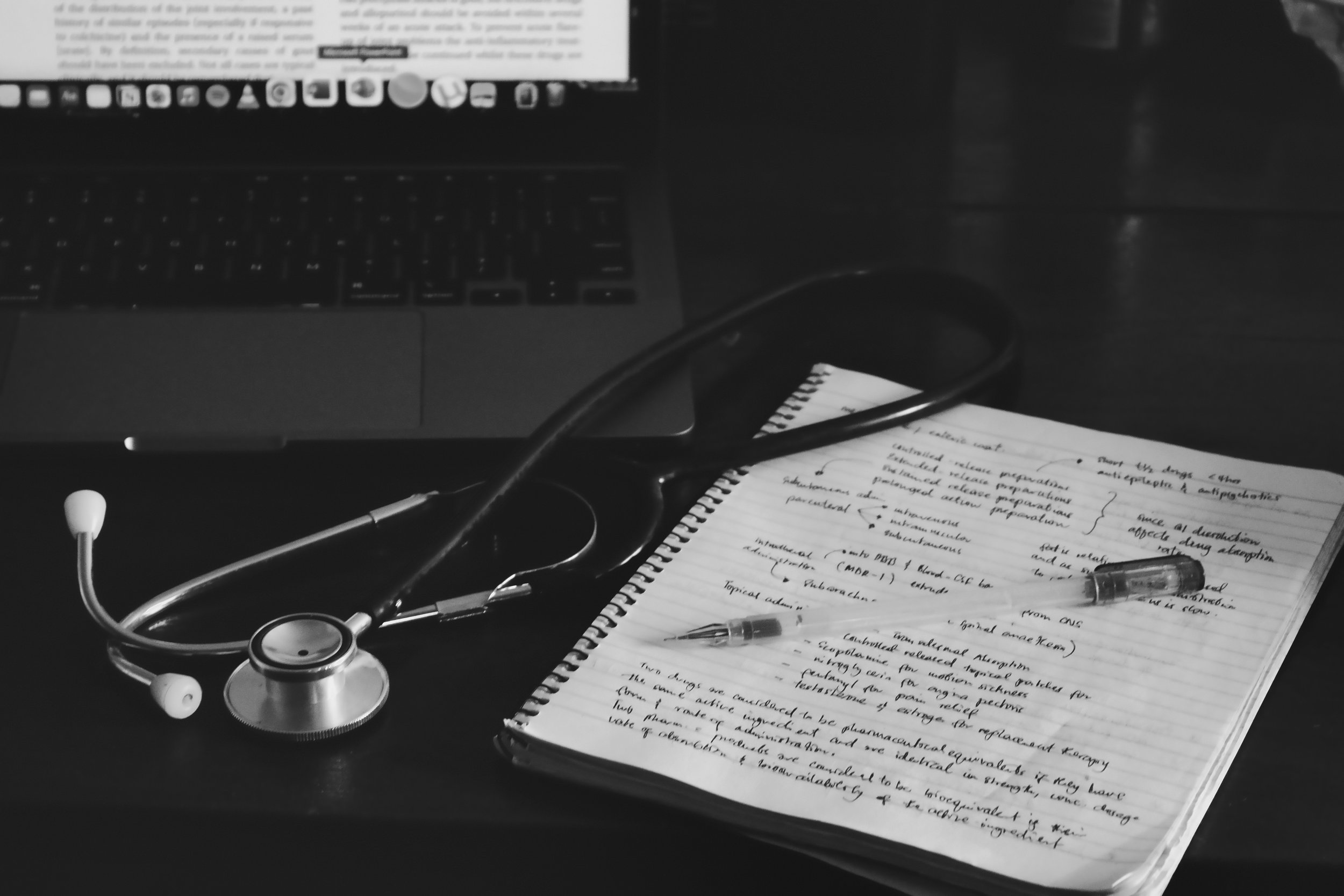 Nurse practitioner reviewing paperwork